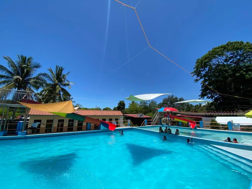 Pool deck with shade sails